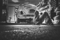 man under a car
